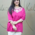 Kala Creation Beautiful Neckline Embroidered Work Plain Short Kurti