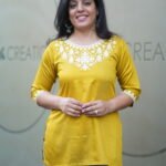 Kala Creation Beautiful Neckline Embroidered Work Plain Short Kurti