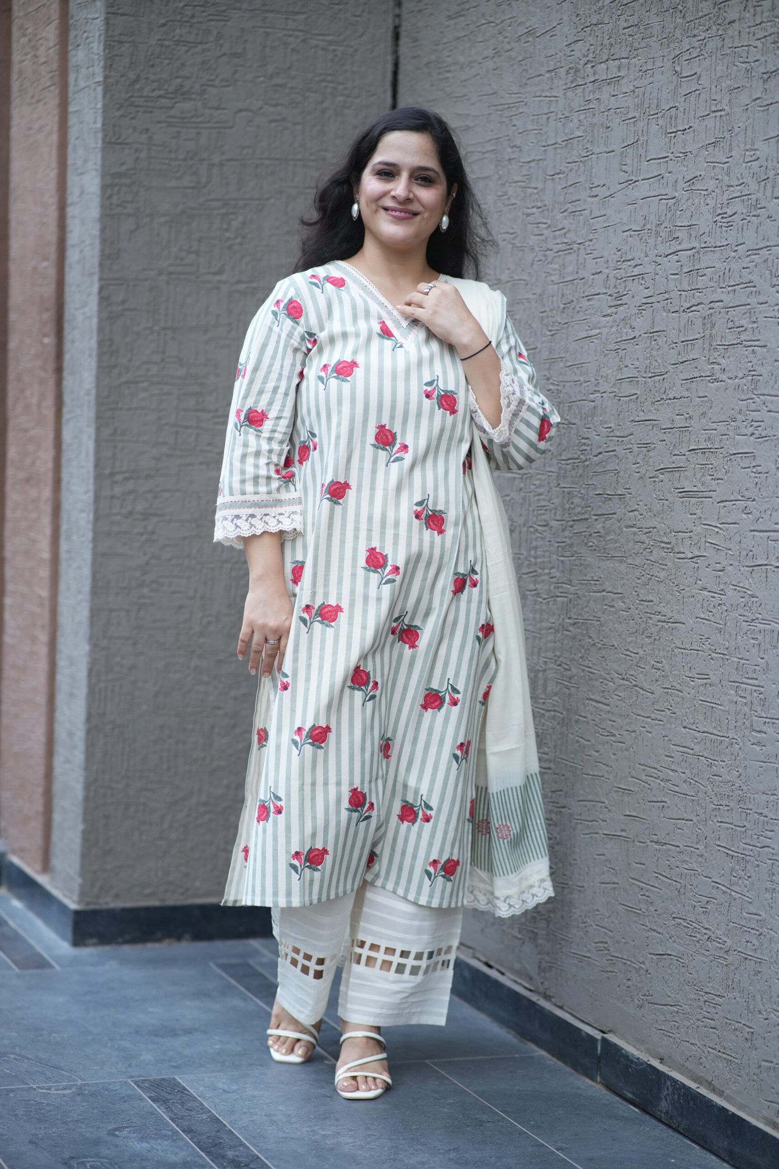 Kala Creation Stylish White And Green Striped Cotton Kurta Set With Red Floral Print And Lace Hem Trousers